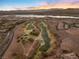 Scenic view of golf course and surrounding luxury townhome community at 20 Via Visione # 104, Henderson, NV 89011