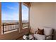 Scenic balcony with comfortable seating to relax and enjoy the gorgeous outdoor views at 20 Via Visione # 104, Henderson, NV 89011