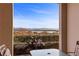 Relaxing balcony view with lake, mountain views, and artistic decor at 20 Via Visione # 104, Henderson, NV 89011