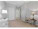 Bright bedroom featuring ample closet space and neutral paint at 20 Via Visione # 104, Henderson, NV 89011