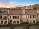 Beautiful multi-Gathering building with a stunning terracotta tile roof and gorgeous desert landscaping at 20 Via Visione # 104, Henderson, NV 89011