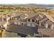 Upscale townhomes with tile roofs, garages, and lake views at 20 Via Visione # 104, Henderson, NV 89011