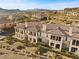 Upscale townhomes with tile roofs, garages, and mountain views at 20 Via Visione # 104, Henderson, NV 89011