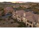 Gorgeous multi-Gathering home with terracotta tile roof, balconies, and mountain views at 20 Via Visione # 104, Henderson, NV 89011