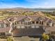 Luxury townhouse with tile roof and multiple garage spaces at 20 Via Visione # 104, Henderson, NV 89011