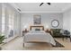 Spacious main bedroom offers private balcony access and a relaxing seating area at 20 Via Visione # 104, Henderson, NV 89011