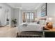 Comfortable main bedroom provides balcony access with fantastic outdoor views at 20 Via Visione # 104, Henderson, NV 89011
