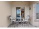 Cozy patio with seating, perfect for enjoying the outdoors and al fresco dining at 20 Via Visione # 104, Henderson, NV 89011