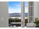 Inviting outdoor seating area with deer sculpture and mountain views at 20 Via Visione # 104, Henderson, NV 89011
