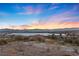 Breathtaking sunset view over the lake and mountains, capturing the beauty of the surrounding nature at 20 Via Visione # 104, Henderson, NV 89011