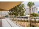 Enjoy resort-style living on this unit's private balcony with beautiful views of the community tennis courts and lush landscaping at 205 E Harmon Ave # 409, Las Vegas, NV 89169