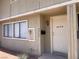 Inviting exterior view featuring a cozy entrance and well-lit facade of the home at 2574 Paradise Village Way, Las Vegas, NV 89120