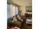 Comfortable living room with neutral tones and soft furnishings at 2574 Paradise Village Way, Las Vegas, NV 89120