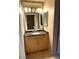 Bathroom vanity with granite countertop and a mirrored medicine cabinet provides a classic touch at 270 E Flamingo Rd # 214, Las Vegas, NV 89169