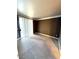 Bedroom with neutral carpet and trim; sliding glass door provides natural light at 270 E Flamingo Rd # 214, Las Vegas, NV 89169