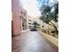 Elegant building courtyard with unique architecture, mature landscaping and walking paths at 270 E Flamingo Rd # 214, Las Vegas, NV 89169