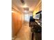 A kitchen with stainless steel appliances, granite countertops, and light wood cabinets is bright and clean at 270 E Flamingo Rd # 214, Las Vegas, NV 89169
