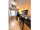 A kitchen with stainless steel appliances, granite countertops, and light wood cabinets is neat and efficient at 270 E Flamingo Rd # 214, Las Vegas, NV 89169