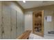 Sauna room with wood bench, lockers and sauna rules posted on the wall at 270 E Flamingo Rd # 214, Las Vegas, NV 89169