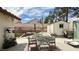 Backyard patio features an outdoor dining set at 2701 Brookstone Ct, Las Vegas, NV 89117