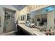 Spacious bathroom with double sinks, marble countertops, and a glass-enclosed shower at 2701 Brookstone Ct, Las Vegas, NV 89117