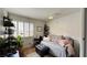 Well-lit bedroom featuring a cozy daybed and lots of plant life at 2701 Brookstone Ct, Las Vegas, NV 89117
