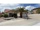 Charming single-story home featuring a desert landscape, concrete driveway, and attached two-car garage at 2701 Brookstone Ct, Las Vegas, NV 89117
