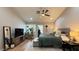 Inviting main bedroom with a ceiling fan, plants, and neutral decor at 2701 Brookstone Ct, Las Vegas, NV 89117