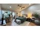 Inviting main bedroom with a ceiling fan, plants, and neutral decor at 2701 Brookstone Ct, Las Vegas, NV 89117