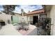 Outdoor patio featuring a full dining set and well kept garden at 2701 Brookstone Ct, Las Vegas, NV 89117