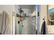Close-up of a modern shower with tile surround and built-in shelving at 2701 Brookstone Ct, Las Vegas, NV 89117