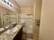 Bathroom featuring granite countertops, modern fixtures, and a glass-enclosed shower at 2707 Chinaberry Hill St, Laughlin, NV 89029
