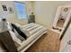Cozy bedroom featuring stylish decor, a comfortable bed, and natural light at 2707 Chinaberry Hill St, Laughlin, NV 89029