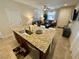 Modern kitchen island with granite countertop, stainless sink, and eating space open to the Gathering room at 2707 Chinaberry Hill St, Laughlin, NV 89029