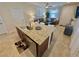 Kitchen island with granite countertop with seating at 2707 Chinaberry Hill St, Laughlin, NV 89029