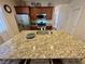 A view of kitchen island featuring stainless steel appliances and granite counters at 2707 Chinaberry Hill St, Laughlin, NV 89029