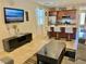 Comfortable living room area with open access to the kitchen and island seating at 2707 Chinaberry Hill St, Laughlin, NV 89029