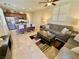 View of a spacious living room adjacent to the open kitchen layout at 2707 Chinaberry Hill St, Laughlin, NV 89029