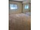 Bedroom with mirrored closet doors and natural light from the window at 2713 Otter Creek Ct # 202, Las Vegas, NV 89117
