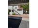 Condo exterior with white facade, staircase, and landscaped grounds at 2713 Otter Creek Ct # 202, Las Vegas, NV 89117