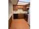 Functional kitchen featuring wood cabinets and standard appliances at 2713 Otter Creek Ct # 202, Las Vegas, NV 89117
