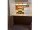 Functional kitchen featuring wood cabinets and standard appliances at 2713 Otter Creek Ct # 202, Las Vegas, NV 89117