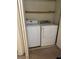 Compact laundry area equipped with a washer and dryer at 2713 Otter Creek Ct # 202, Las Vegas, NV 89117