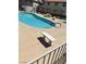 Bright, community swimming pool area with plenty of seating and lounge space for residents and guests at 2713 Otter Creek Ct # 202, Las Vegas, NV 89117