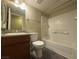 Bright bathroom featuring a single sink vanity with granite countertop and a shower-tub combination at 2750 S Durango Dr # 1038, Las Vegas, NV 89117
