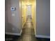 A long hallway with durable flooring and neutral wall colors at 2750 S Durango Dr # 1038, Las Vegas, NV 89117