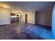 Open-concept living area flows seamlessly into the kitchen with matching tile floors at 2750 S Durango Dr # 1038, Las Vegas, NV 89117