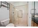 Modern bathroom featuring a glass shower enclosure with marble accents, complemented by contemporary fixtures and finishes at 2805 High Sail Ct, Las Vegas, NV 89117