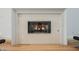 Close-up of marble fireplace with gas fire insert at 2805 High Sail Ct, Las Vegas, NV 89117