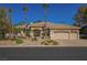 Charming home featuring desert landscaping, circular driveway and a three-car garage at 2805 High Sail Ct, Las Vegas, NV 89117